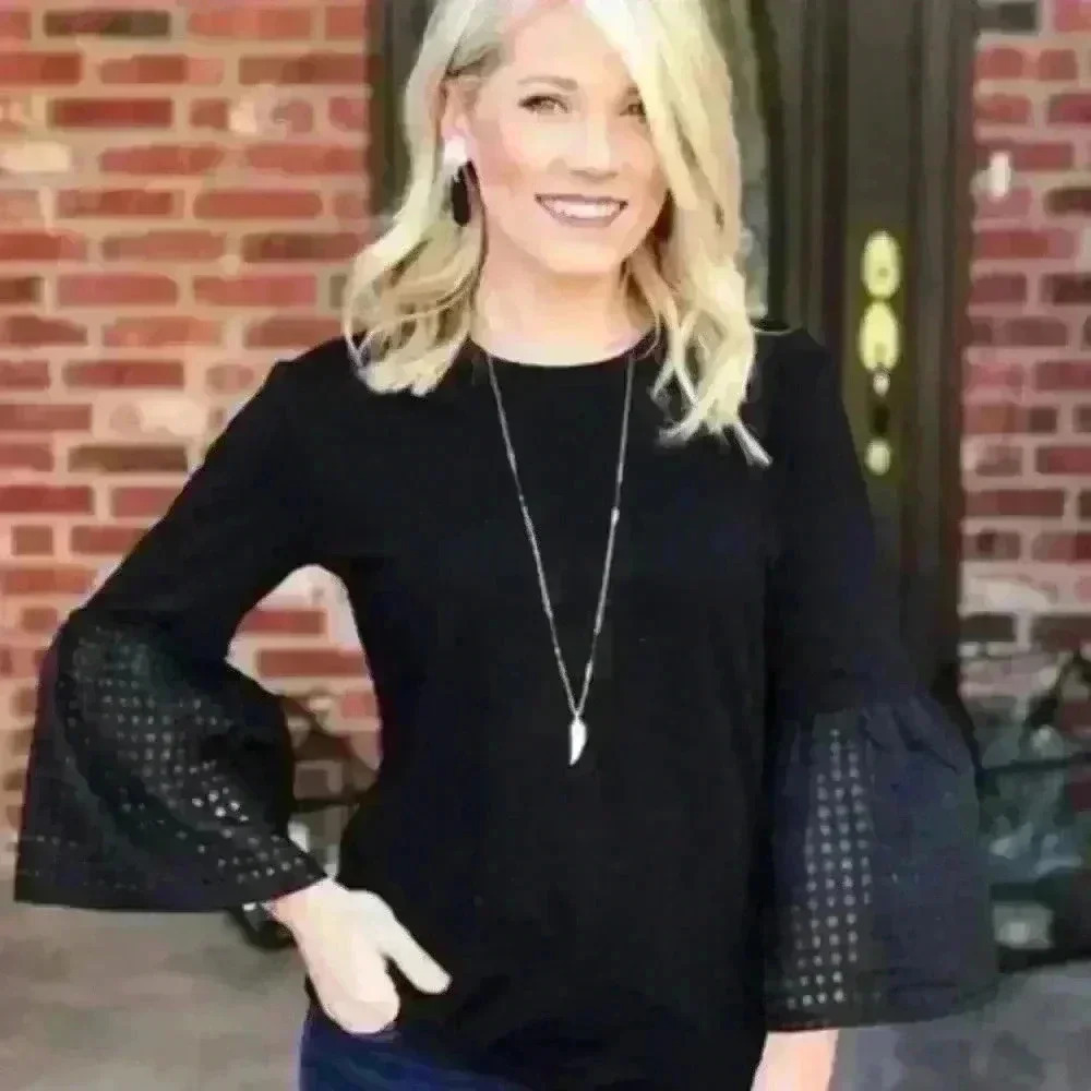 Stella & Dot black t shirt fitting with 3/4 length bell sleeves. Size Medium.